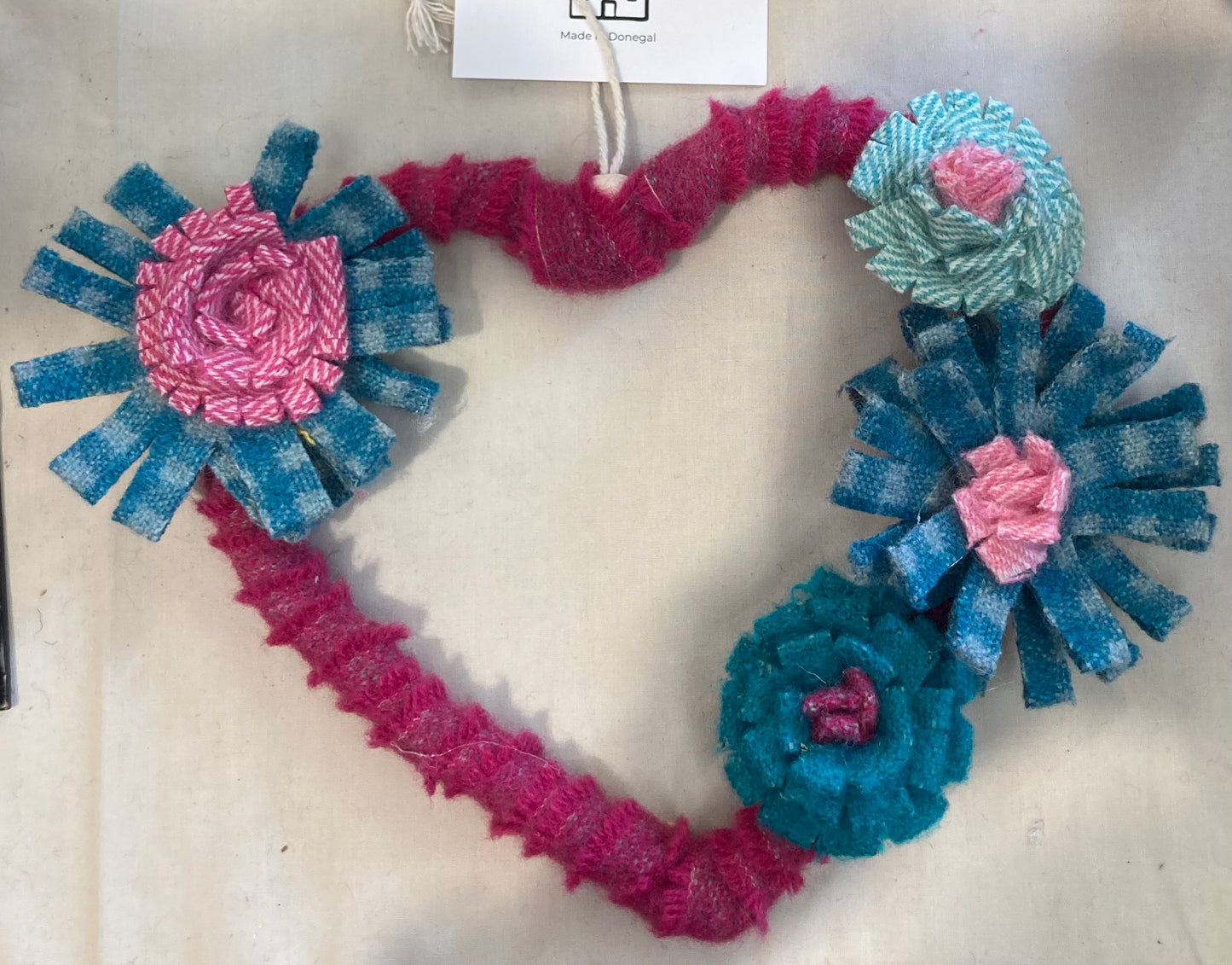 Tweed heart embellished with tweed flowers